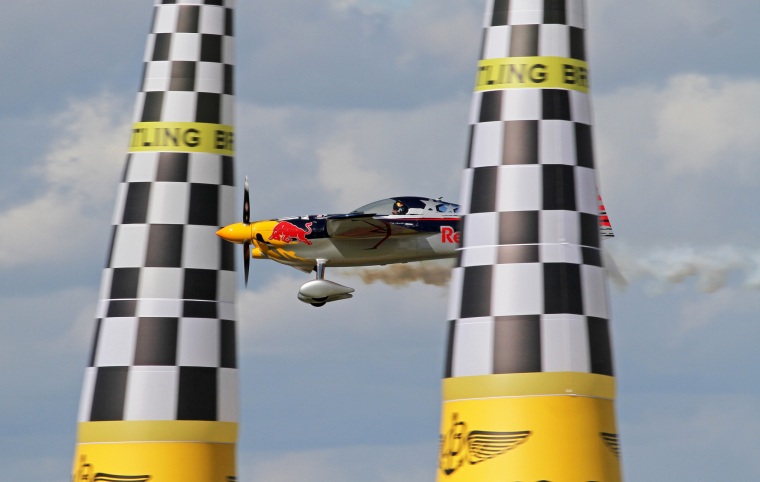 Kirby Chambliss wows the crowds navigating the air race course at the 2014 Red Bull Air Race. Image: Tony Hisgett, Flickr.